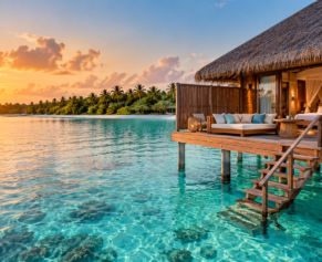 Overwater bungalow above a turquoise Maldives lagoon